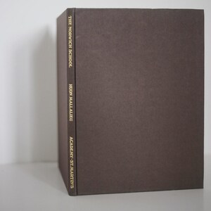 May include: A brown book with gold lettering on the spine. The text reads "The Norwich School", "Hugh Malalieu", and "Academy St. Martin's".