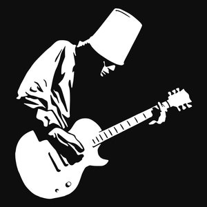 May include: A black and white graphic of a musician playing an electric guitar. The musician is wearing a white bucket on their head and a white shirt. The guitar is white, with visible strings and tuning pegs.