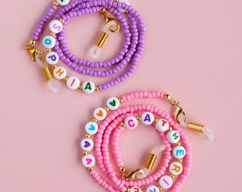 Children's personalised eyeglass chain. Pink name chain. Purple name chain.