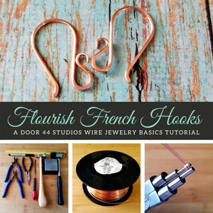 May include: A close-up of two copper French hook earring findings. The hooks are made of 20 gauge copper wire and are shown on a turquoise blue wooden background. The image also shows the tools and materials needed to make the hooks, including copper wire, pliers, a hammer, and a ruler. The text "Flourish French Hooks" and "A Door 44 Studios Wire Jewelry Basics Tutorial" is displayed below the hooks.