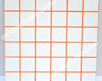 May include: Square white tiles with orange grout lines, arranged in a grid pattern. The tiles are evenly spaced, creating a clean and modern look. The orange grout provides a striking contrast against the white tiles.