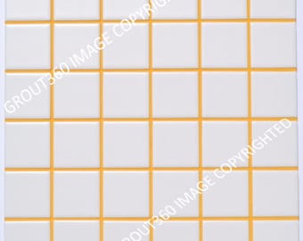 May include: Square white tiles with orange grout lines, arranged in a grid pattern. The tiles are evenly spaced, creating a clean and modern look. The image is a close-up, showcasing the texture and color contrast.