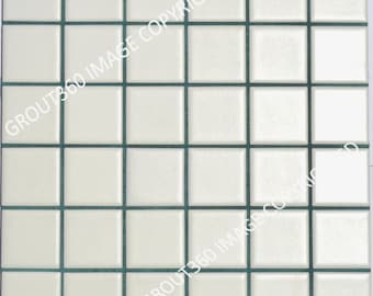 May include: Square, off-white ceramic tiles arranged in a grid pattern with dark green grout lines. The tiles have a slightly textured surface and are evenly spaced, creating a clean and modern look. The image is a close-up, showcasing the tile's details.