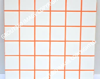 May include: Square white tiles with orange grout lines, arranged in a grid pattern. The tiles are evenly spaced, creating a clean and modern look. The orange grout provides a striking contrast against the white tiles.