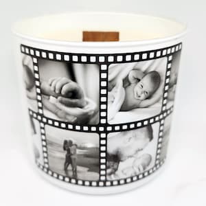 May include: White ceramic candle jar with a film strip design. The jar features black and white photos of a baby and family members.