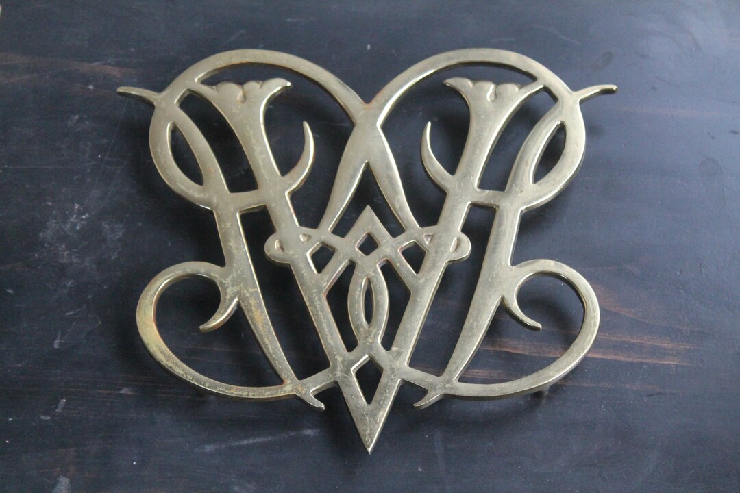 Virginia Metalcrafters CW1010 Queen Ann Cypher Brass Trivet Copyright