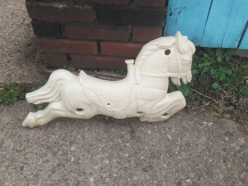 vintage plastic rocking horse