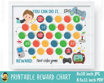 May include: A framed printable reward chart with a game theme. The chart features colorful circles, game-related illustrations, and the text "YOU CAN DO IT, ERIC". The reward is a new video game. The chart is 8x10 inches.
