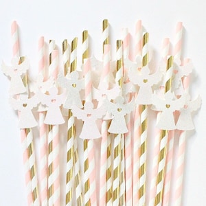 May include: A bundle of pink and gold striped paper straws with white glitter angel cutouts attached to the top.