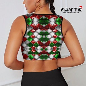 May include: A sleeveless crop top with a geometric pattern in red, green, and white. The top has a black trim around the neckline and armholes. The text "PSYTE CLOTHING" is visible in the top right corner of the image.