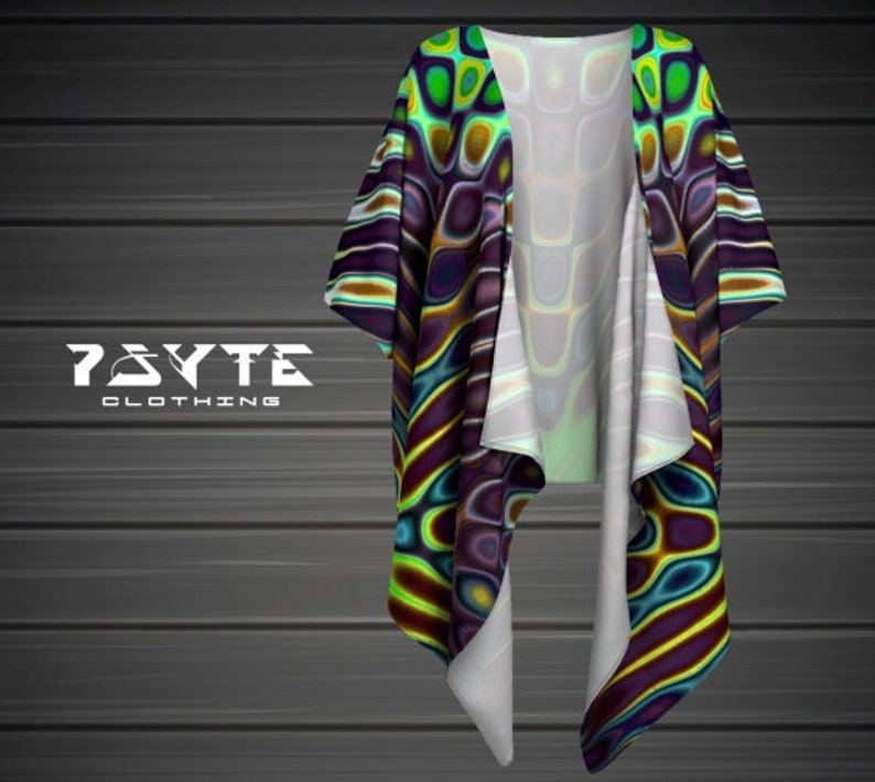 May include: A colorful abstract print kimono with a green, purple, and yellow color scheme. The kimono is made of a lightweight fabric and has a flowing silhouette.
