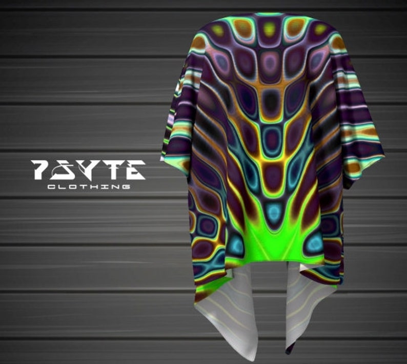 May include: A green, blue, and brown psychedelic patterned shirt with a short sleeve and a tie-dye effect. The shirt has a large, abstract design with a green, blue, and brown color scheme. The shirt is made of a soft, comfortable material and is perfect for everyday wear.