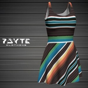 May include: A sleeveless dress with a colorful striped pattern. The dress has a fitted bodice and a flared skirt. The stripes are in shades of blue, green, orange, and brown.