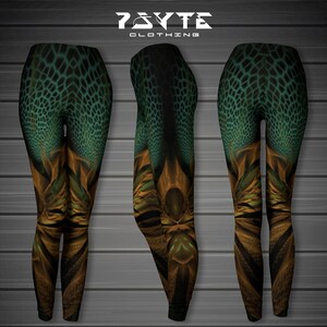 May include: Green and gold leggings with a geometric pattern. The leggings are made of a stretchy, comfortable fabric and are perfect for yoga, running, or any other workout.