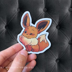 Eevee Winking Sticker | Waterproof Dishwasher Safe 3&quot; Vinyl Car Laptop Decal | Cute Fox Monster Bitty Baby