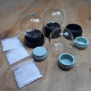 45mm Snow Globe Kit: Black Resin Base, Fake Snow (Set of Three)