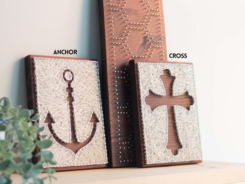 Stress relief string art craft kit with anchor and cross designs on stained wood base, beginner friendly DIY hobby for adults.