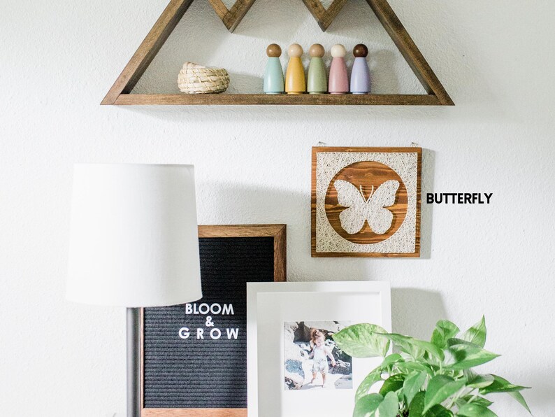 Stress relief craft kit for adults featuring butterfly string art wall decor displayed in a modern home interior.