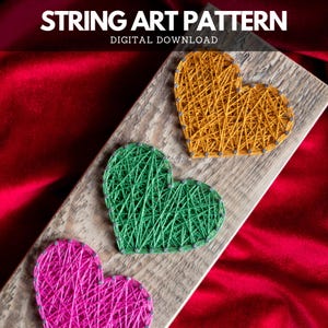 May include: Three string art hearts in different colors on a wooden board. The hearts are yellow, green, and pink. The board is on a red fabric background.  The image is titled "String Art Pattern - Digital Download".