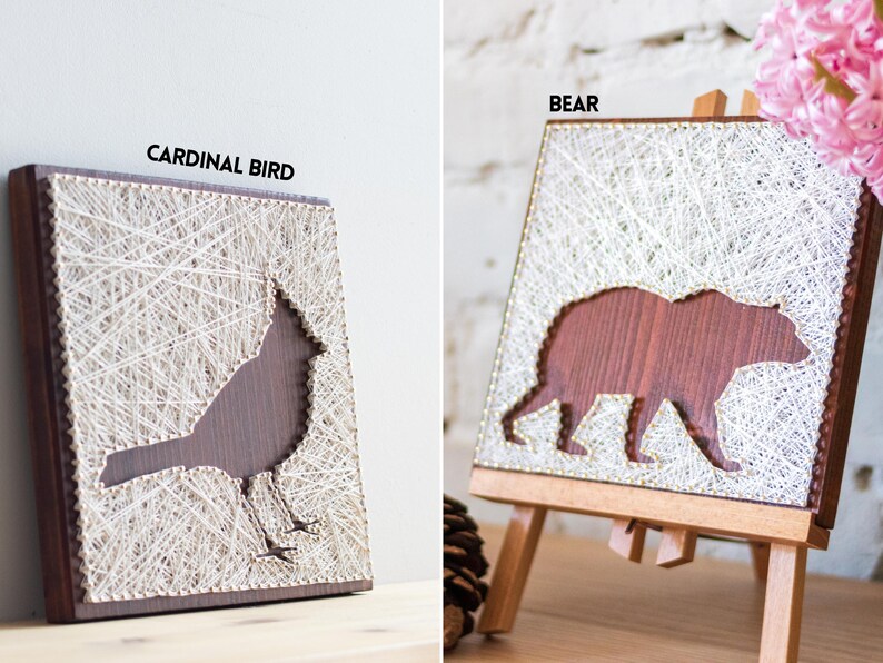 Stress relief craft kit for adults with cardinal bird and bear string art designs on stained wood base, relaxing DIY wall decor project.