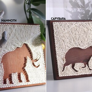 Stress relief string art craft kit for adults featuring mammoth and capybara designs on stained wood base, relaxing DIY wall decor project.