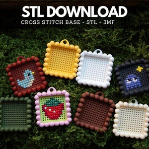 May include: A collection of square cross stitch bases with scalloped edges, featuring STL DOWNLOAD and CROSS STITCH BASE - STL - 3MF text. Some frames are empty, while others contain stitched designs of a blue bird, a strawberry, and a ghost.