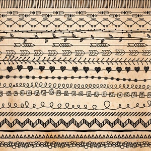 May include: A collection of 14 hand-drawn black and white border designs on a brown paper background. The designs include arrows, hearts, leaves, zigzags, and other geometric shapes.