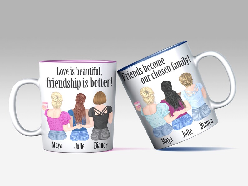 May include: Two white ceramic mugs with blue and pink rims. The mugs feature a design of three women with their arms around each other. The text on the mugs reads "Love is beautiful, friendship is better!" and "Friends become our chosen family!" The names Maya, Jolie, and Bianca are written below the women on each mug.