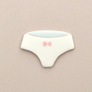 Panties. Ceramic pin