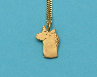 Licorne. Pendentif et collier en laiton doré