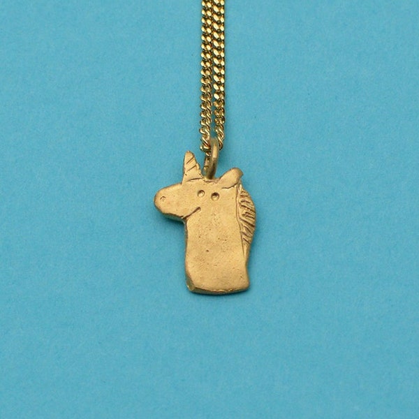 Licorne. Pendentif et collier en laiton doré