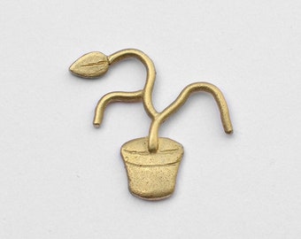 Green Thumb. Brass pin. Dead plant killer