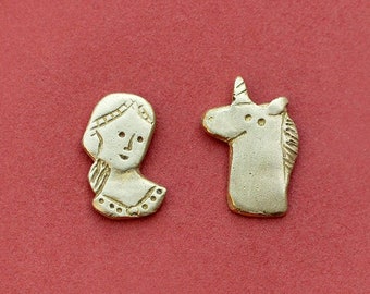 The Lady and the Unicorn earrings. Raw brass