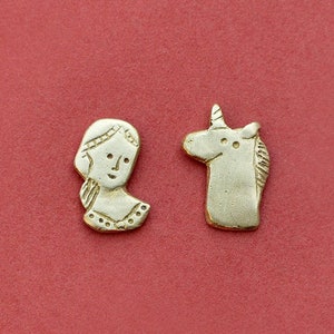 The Lady and the Unicorn earrings. Raw brass