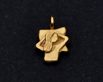 Napping, small pendant. Gold plated chain necklace