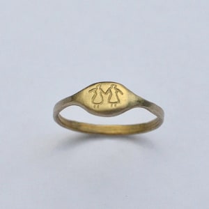 Two Sisters. Brass Ring