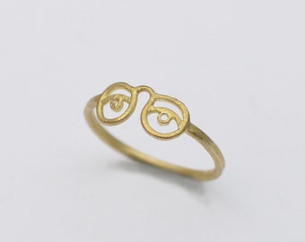 Eyeglass ring. Brass