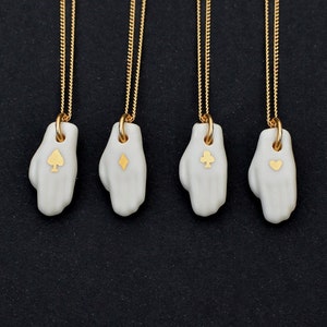 Hand necklace. Ace of hearts, spades, diamonds, clubs