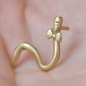 Worm With Bow Tie. Handmade brass pin