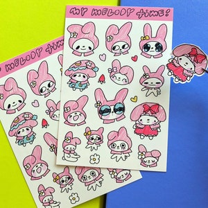 May include: Two sheets of pink and white stickers featuring My Melody, a popular Japanese character. The stickers are decorated with various images of My Melody, including her wearing different outfits and accessories. The text "My Melody Time!" is printed on the top of the sheets.