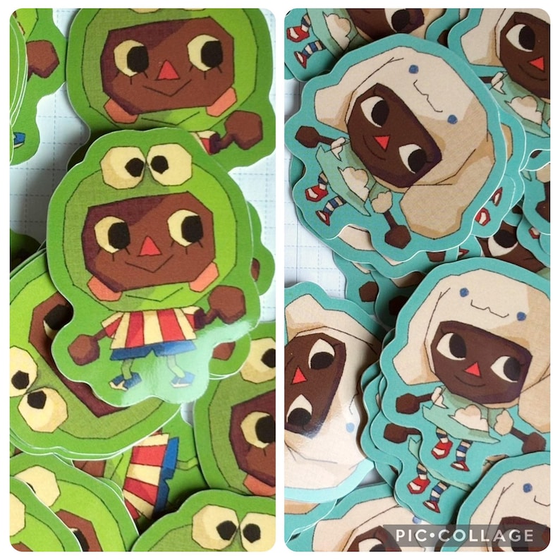May include: A collection of colorful stickers featuring cartoon characters. One design shows a character in a green frog costume, while another depicts a character in a white hooded outfit. The stickers have a whimsical, illustrated style.