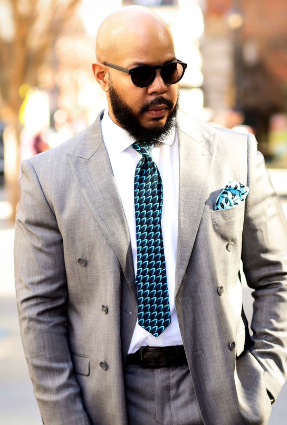 Gray tux large blue tie