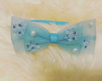 Aqua tulle bow headband with faux pearls and snowflakes