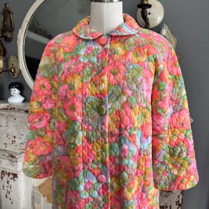 May include: A set of three ceramic mugs with a speckled, matte finish. The mugs are in shades of cream, light gray, and dark gray. Each mug has a simple, minimalist design, perfect for coffee or tea.