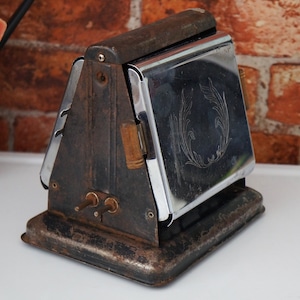 Tostadora antigua de dos puertas, puertas cromadas, Dominion Electrical, modelo 1101, corona de laurel, láminas de mica, sin cable, vintage, pequeño electrodoméstico de cocina, década de 1920