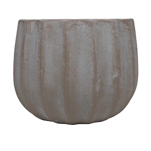 May include: A light brown ceramic planter with a ribbed texture and a slightly distressed finish.