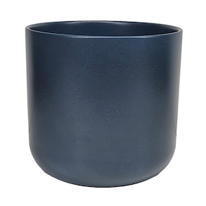 May include: A dark blue ceramic planter with a rounded bottom and a smooth, matte finish.