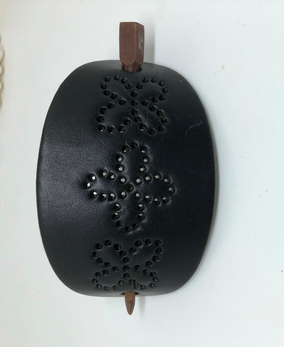 Vintage black tooled leather stick ponytail holder