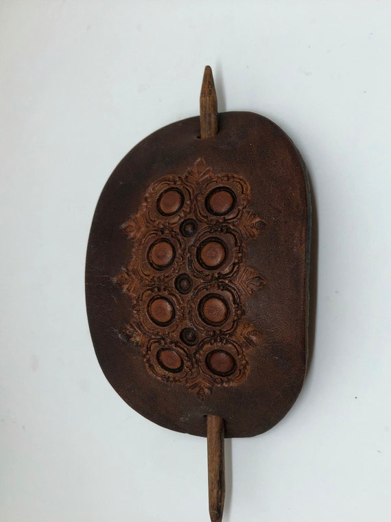 Vintage tooled leather stick ponytail holder