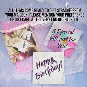 May include: Three gift cards with different messages. The first card has a floral design and the text "i love you". The second card has a colorful design and the text "A Special Gift just for You!". The third card has a white background with the text "Happy Birthday!" in purple.